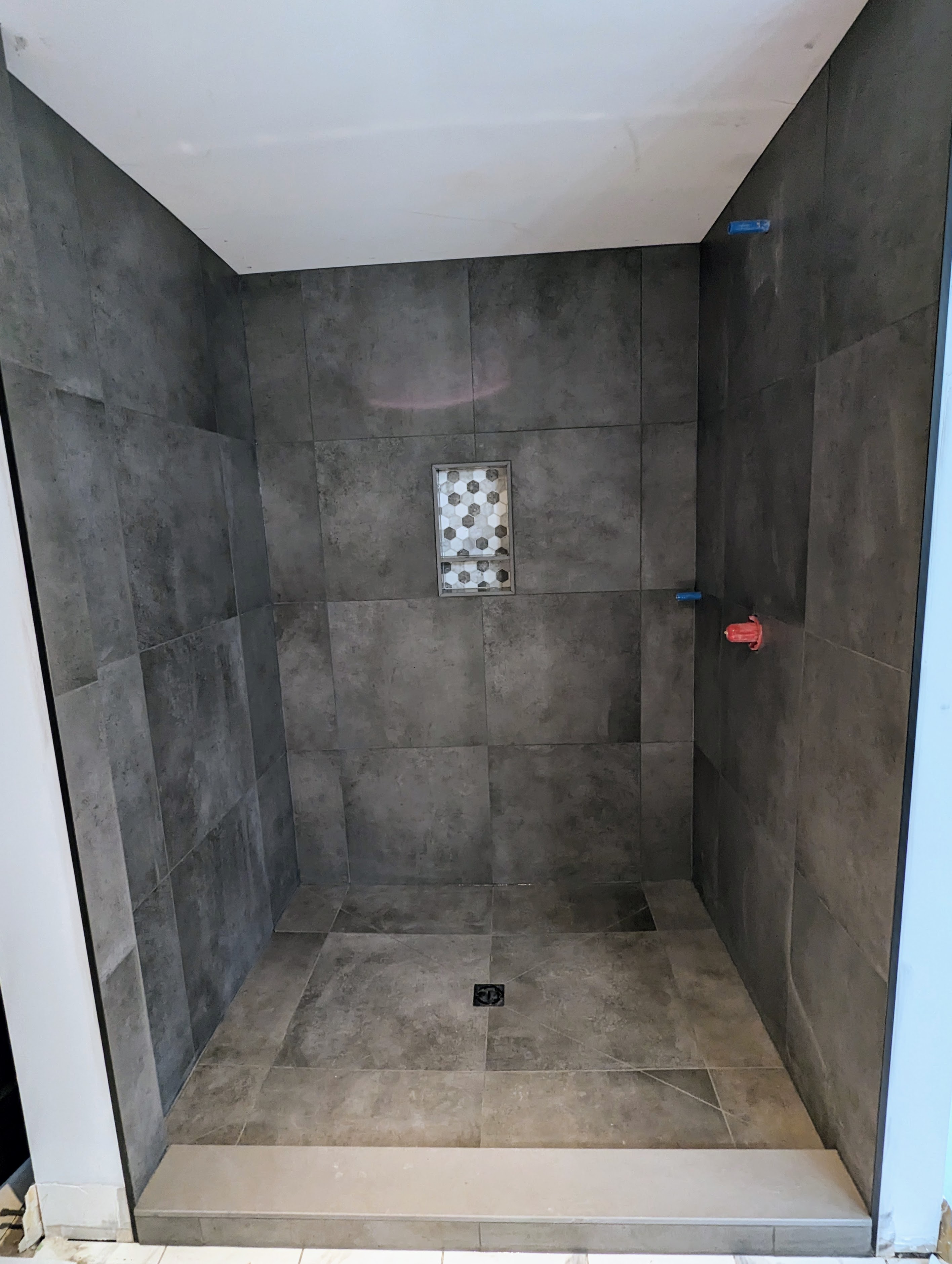 Large tile custom shower installation — Plitka Construction
